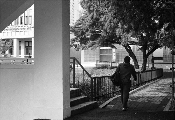 Article photograph of a person walking through Bukchon